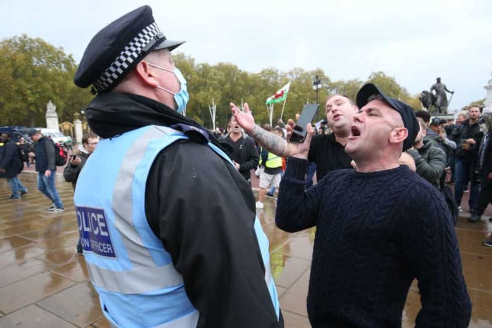 Police make arrests after thousands protest restrictions in London