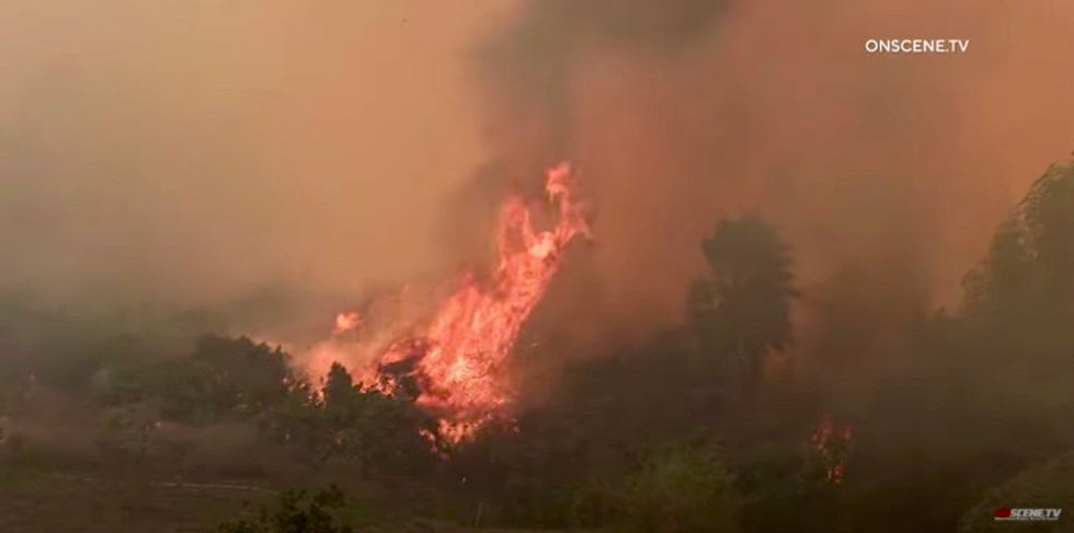 Growing wildfire forces evacuation of 60,000 people in Southern California