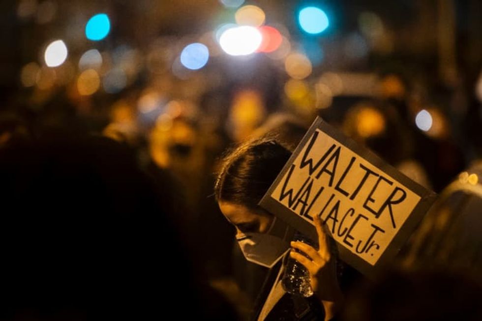 Second night of clashes in Philadelphia after police kill Black man