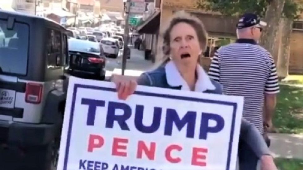 WATCH: Crazed Trump supporter screams the N-word while ranting about 'communism'