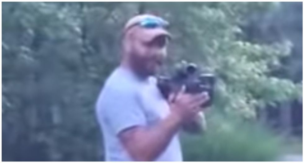 WATCH: White man brandishes rifle as he accuses Black bikers of being on 'private' road