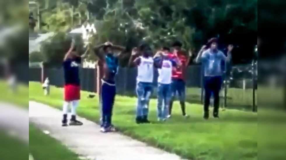 'They are babies!' Bystanders plead with Georgia officers as they hold 5 black children at gunpoint
