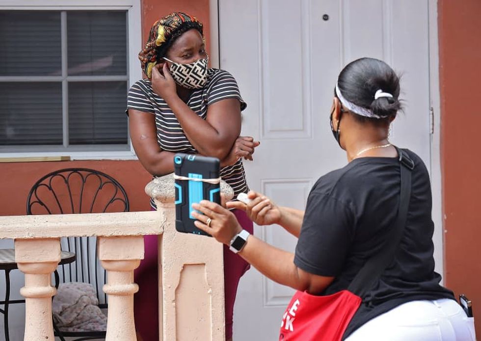 With Florida's hotel workers still jobless, unions pivot to canvass for Democrats