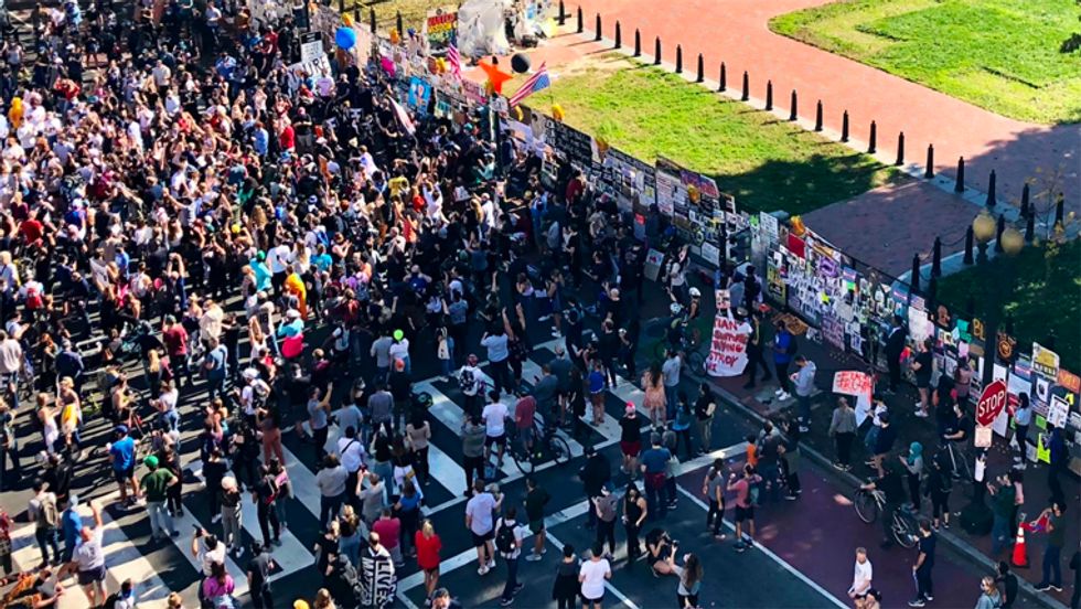 'Na na na na, hey hey hey, goodbye': Massive crowd surrounds White House after Trump defeated by Biden