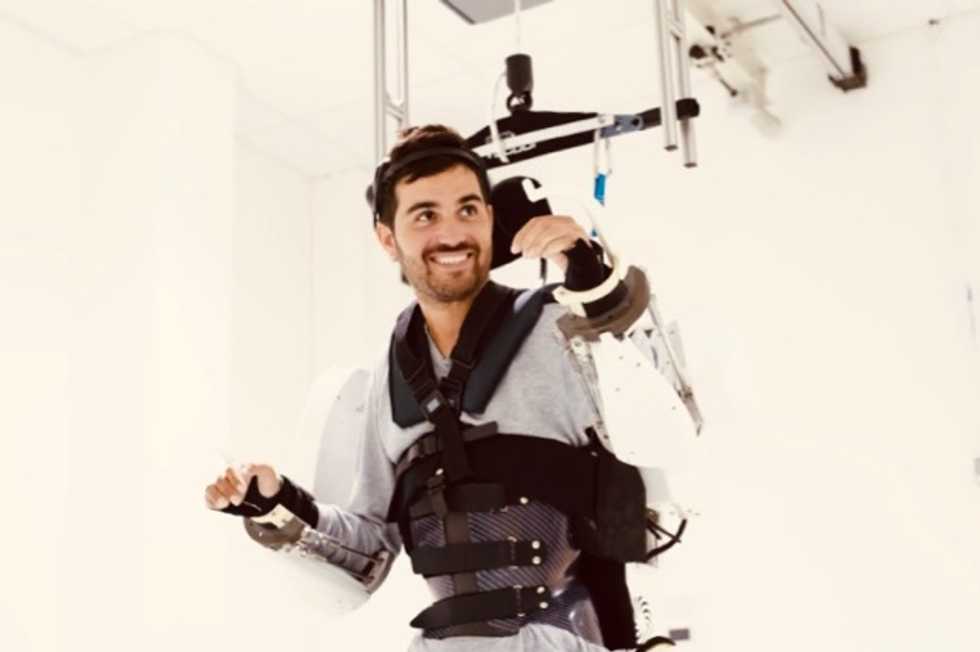 Paralyzed man walks again with brain-controlled exoskeleton