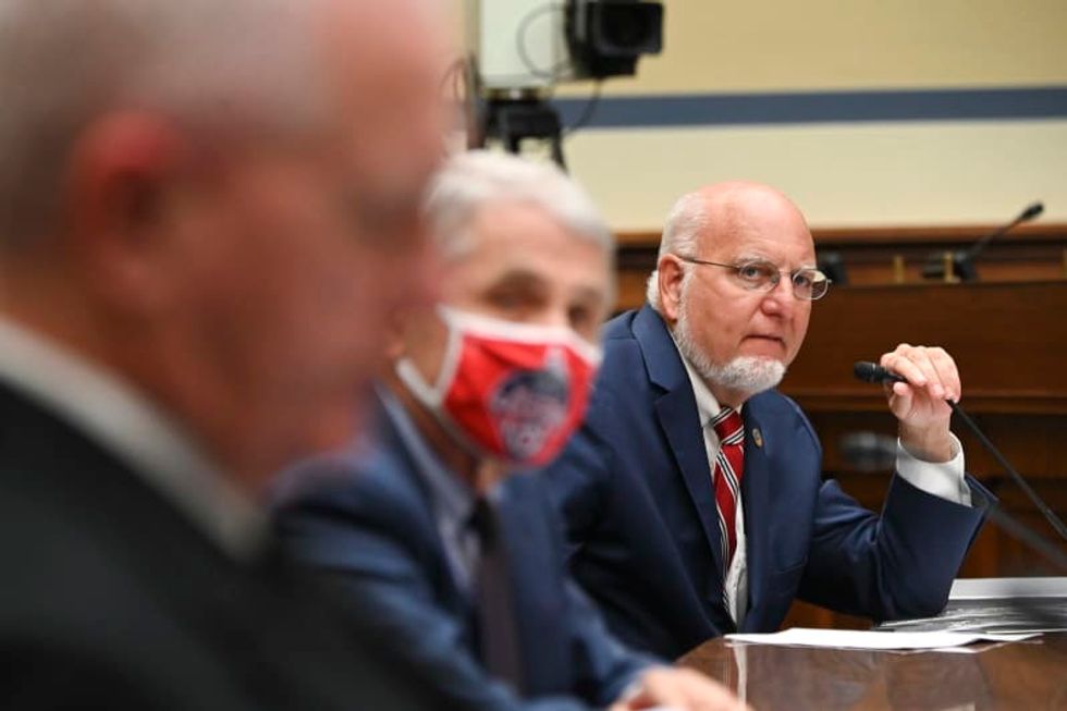 As CDC reverses itself on COVID-19, Americans are losing trust, warn public-health experts