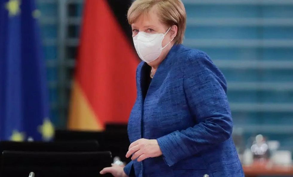 Sparing no words for Trump, Merkel vows cooperation with Biden