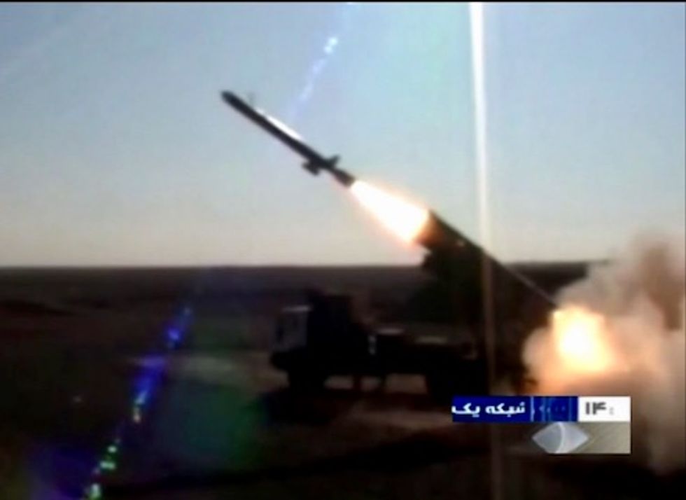 Iran reveals missile, shows off underground factory