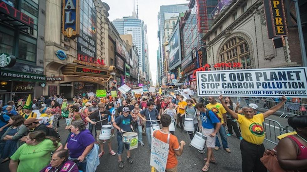 This week in Photos: 30 images from the People's Climate March and Flood Wall St.