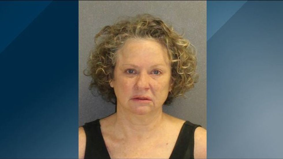White woman tells black cop he'll get a visit from the KKK after he busts her for drunk driving