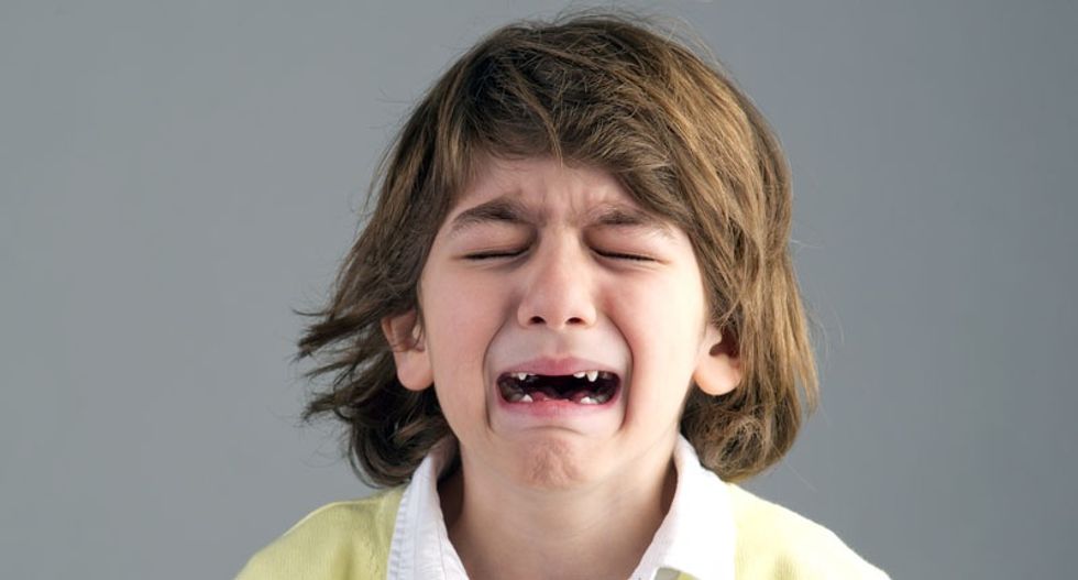 Is it OK to spank a misbehaving child once in a while?