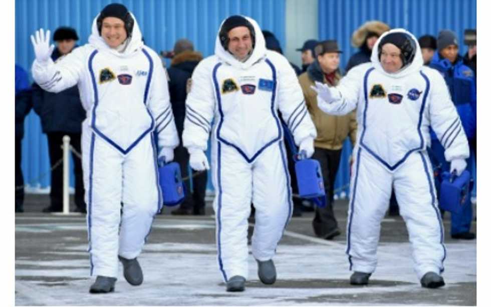 Crew of three docks at International Space Station