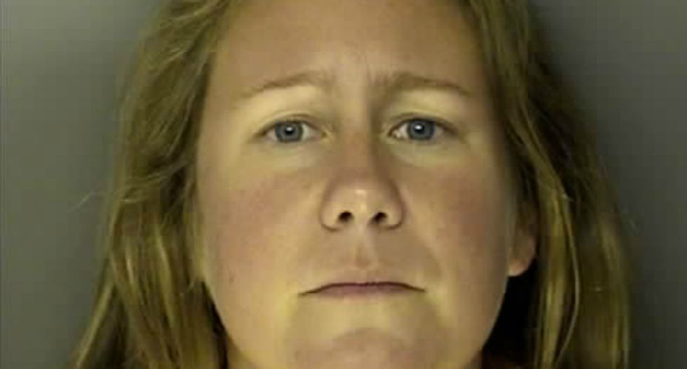 White South Carolina woman arrested for chasing a black man with a hammer while yelling slurs outside a motel