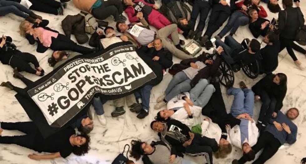 Protester flashes the House of Representatives while screaming in opposition to the tax bill: report