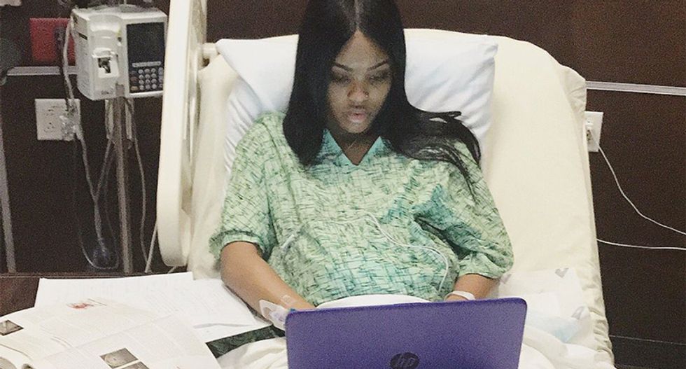 Viral photo of pregnant woman finishing college finals while in labor breaks the internet