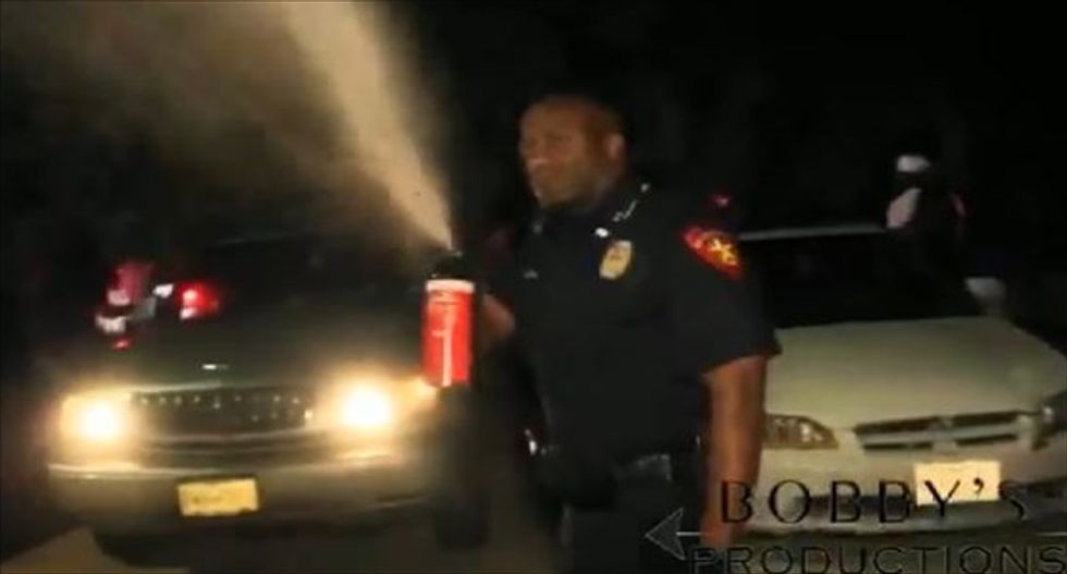 Texas police officer under investigation for pepper-spraying bystander filming him