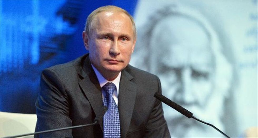 Vladimir Putin accuses Obama of 'attempts to blackmail' Russia