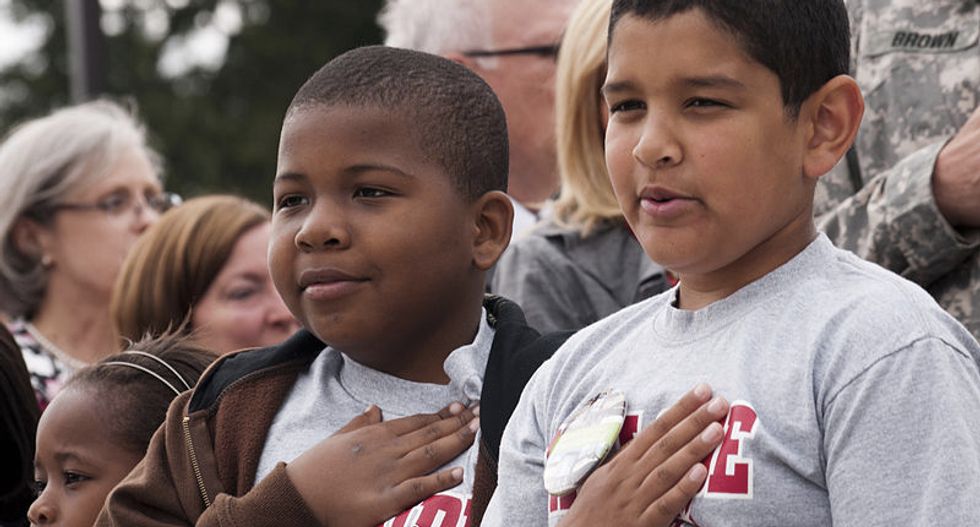 11-year-old Florida boy arrested for refusing to stand for the Pledge of Allegiance