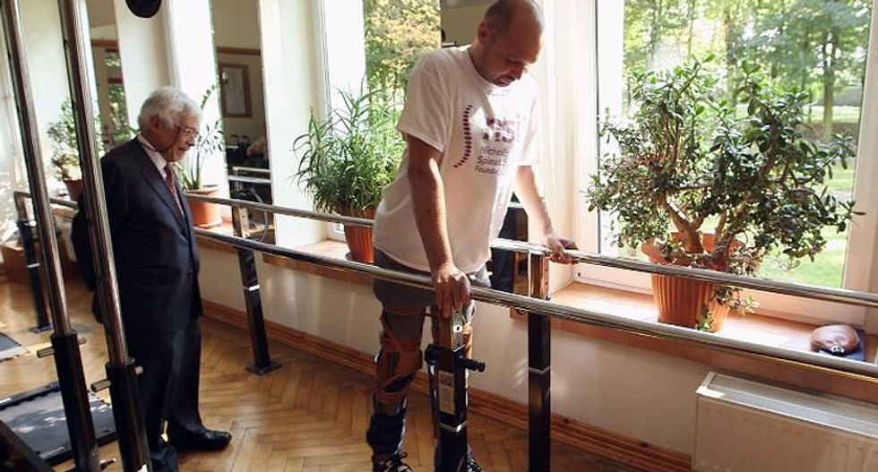 Paralyzed man walks again after breakthrough spinal treatment
