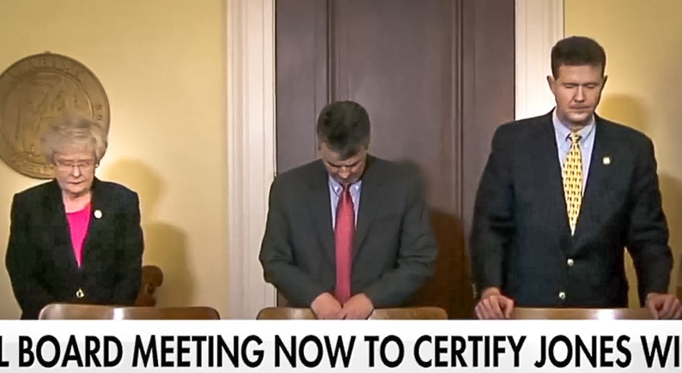 Alabama officials pray to God before certifying Doug Jones and officially ending Roy Moore’s candidacy