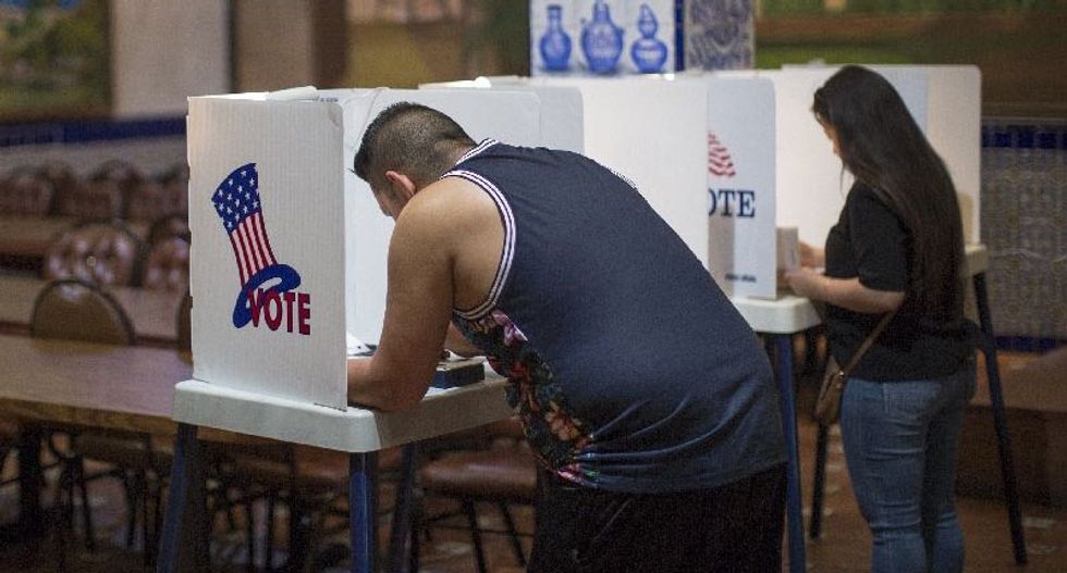 US judge finds Texas voter ID law was intended to discriminate