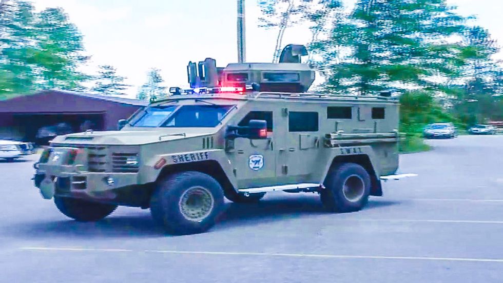 Wisconsin cops deploy armored vehicle to collect fines from 75-year-old man for messy land