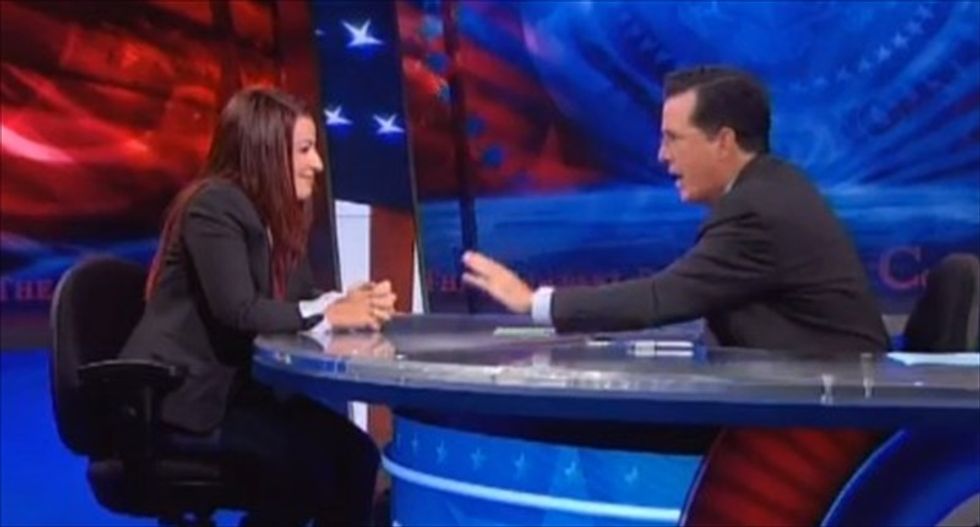 Stephen Colbert presses feminist game critic Anita Sarkeesian: What's wrong with women in nipple armor?