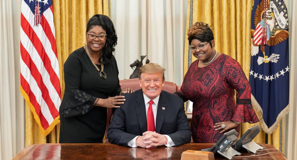Trump isn't managing the coronavirus crisis or anything else – He just spent an hour in the White House with Diamond & Silk