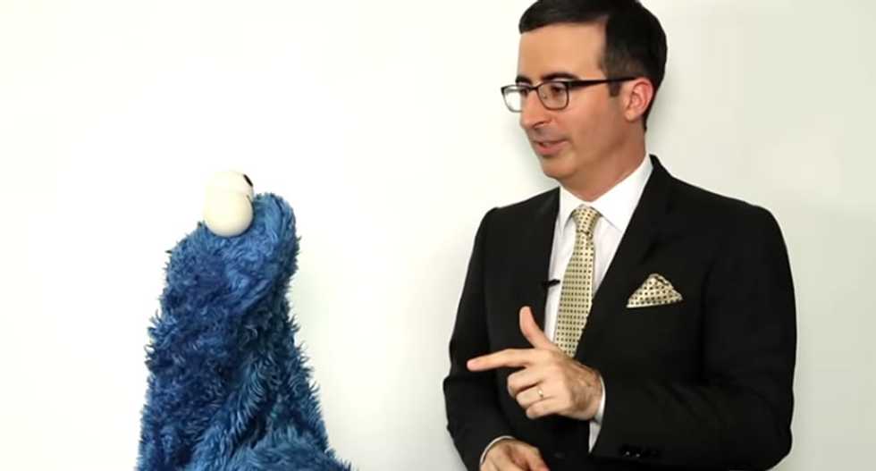 WATCH: John Oliver shares the harsh facts of life in Britain with Cookie Monster
