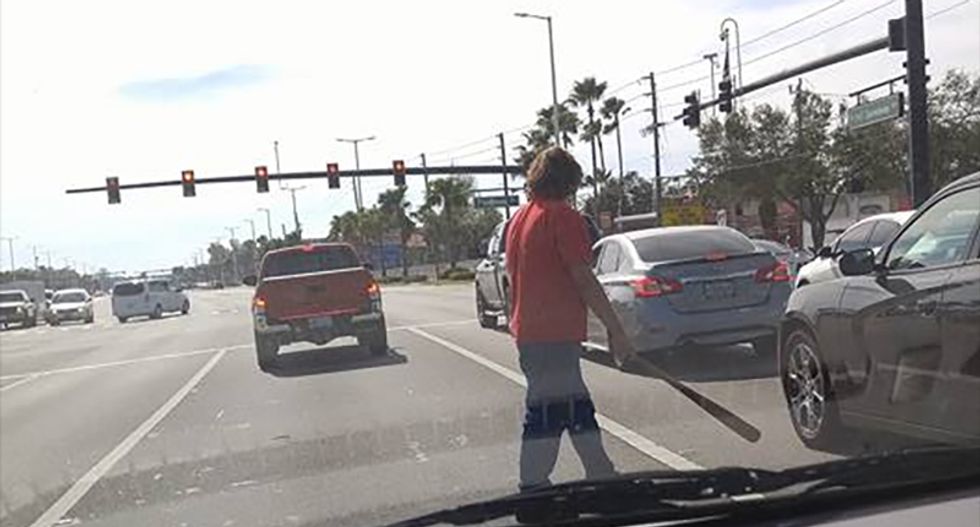 Confederate flag-waving Trump fan chases black kids on bikes and menaces drivers with bat: report