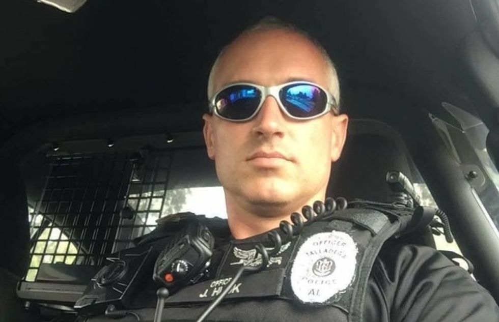 Trump-loving cop fired over racist Facebook posts about Michelle Obama's fluency in 'ghetto'