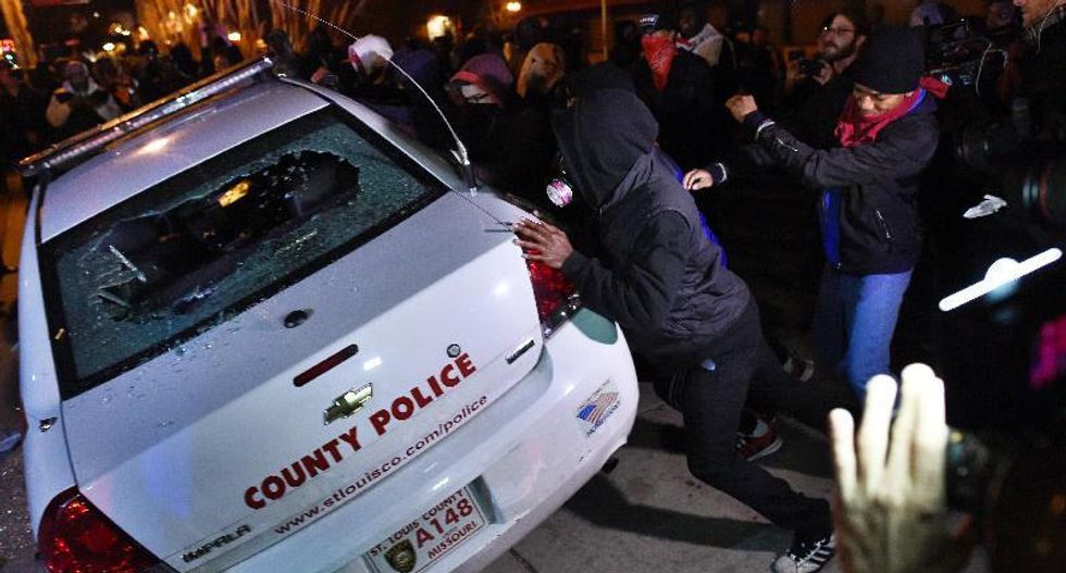 Unrest in Ferguson lets Moscow score points against Washington