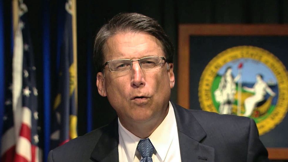 'Shame on you!': Protesters chase Lou Dobbs and 'anti-gay bigot' ex-NC Gov. Pat McCrory down DC street