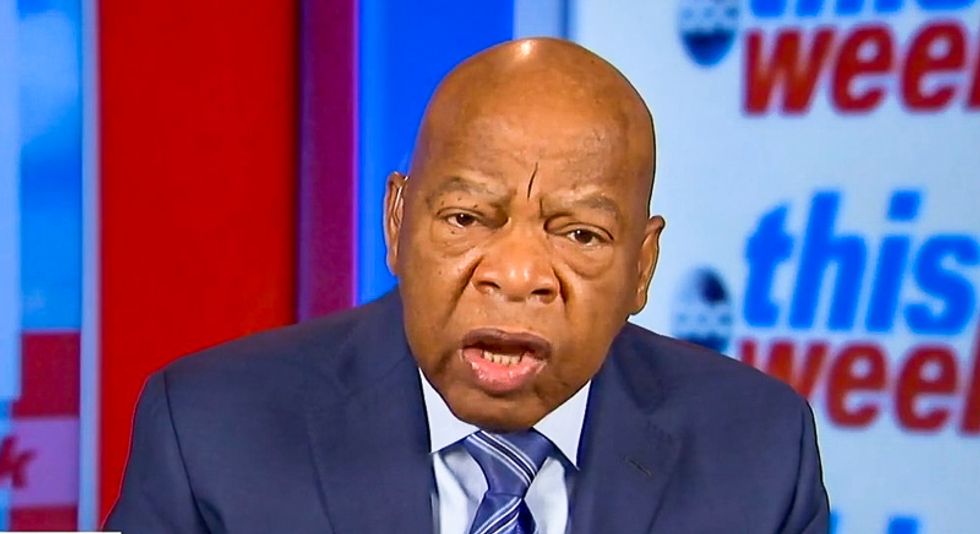 'He is a racist': Civil rights icon John Lewis says Trump 'made me cry' with MLK photo op after Africa slurs