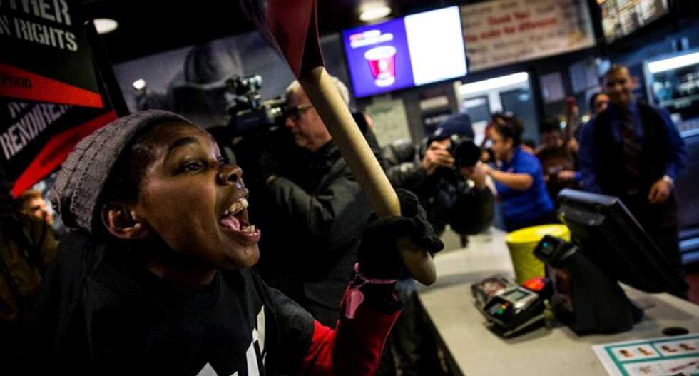 Fight for $15 swells into largest protest by low-wage workers in US history