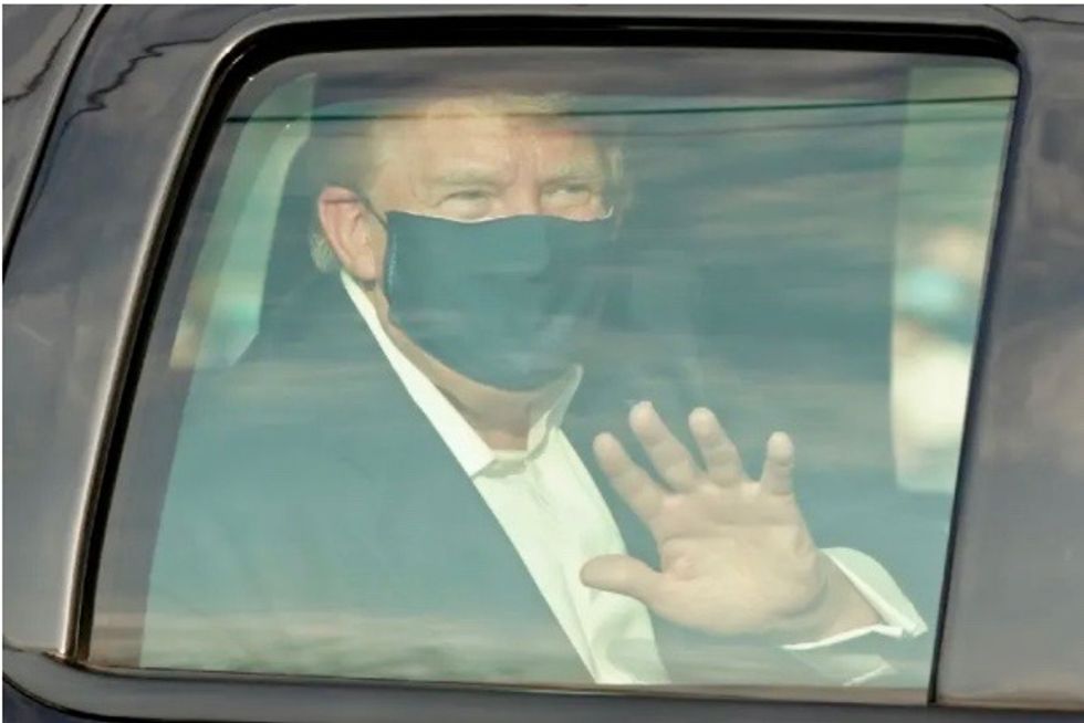 Trump criticized for leaving hospital to greet supporters