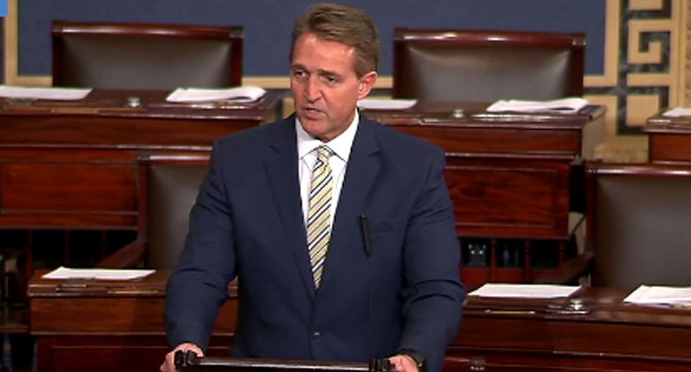 Furious Jeff Flake comes close to calling Trump a traitor: 'He gave aid and comfort to an enemy of democracy'