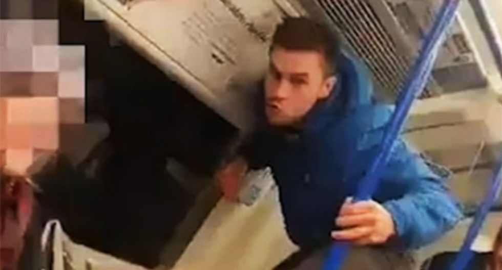 WATCH: Gang of white men taunt black subway passenger with 'monkey impressions' in ugly racist attack