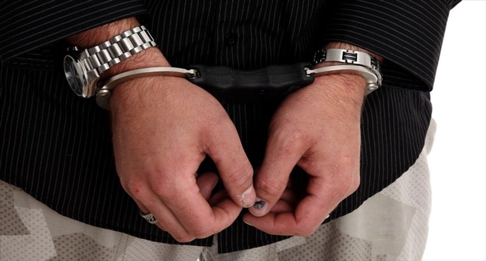 Boston-area police officer charged with beating suspect in handcuffs