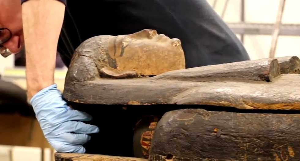 Egyptian mummy emerges from coffin for first time in 2,300 years