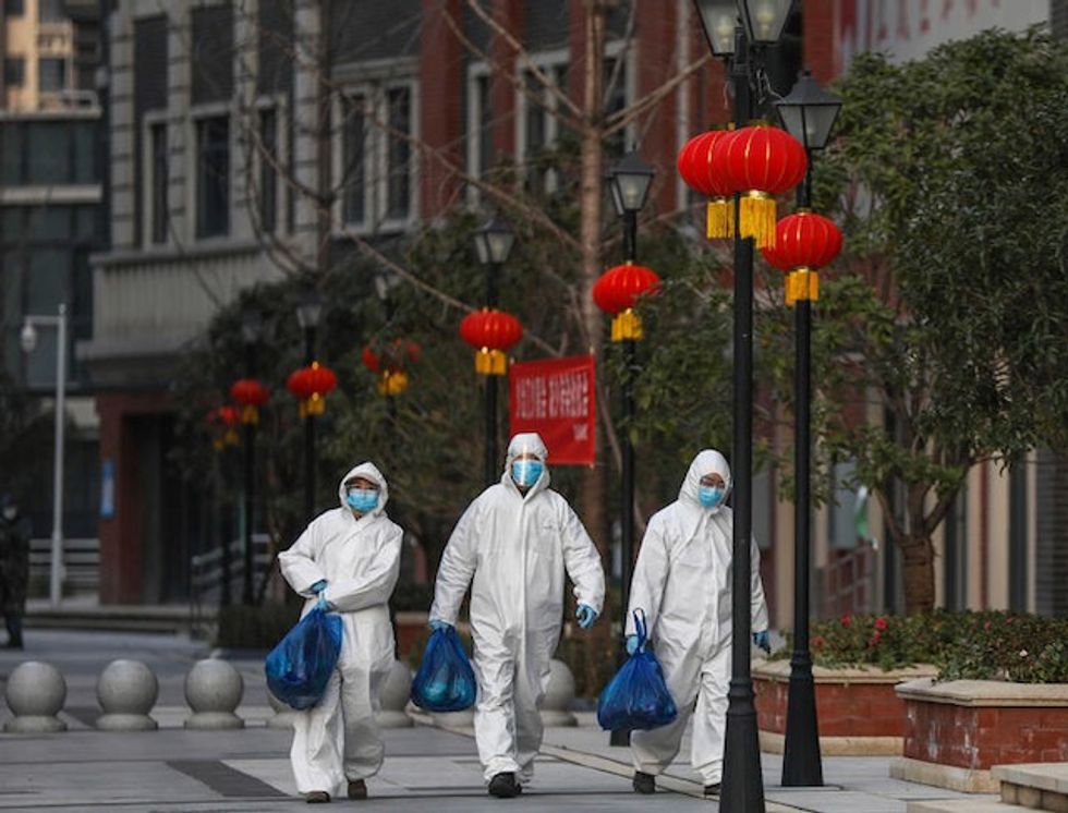 Wuhan residents decry 'fake' work as Chinese official tours city