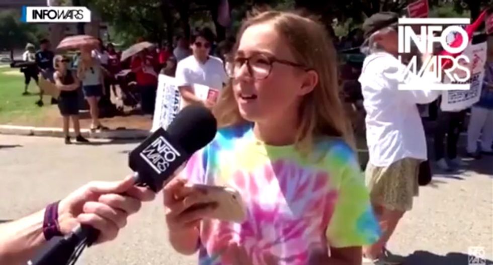 'You're a f*cking idiot': InfoWars reporter stunned after he's brutally mocked by young girl