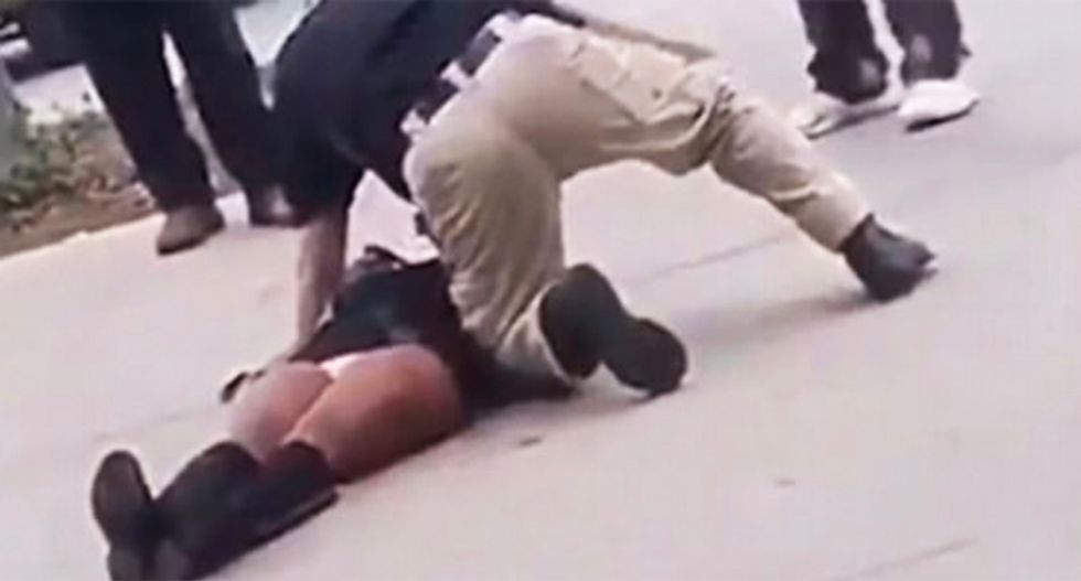 WATCH: San Diego cop body-slams handcuffed 17-year-old girl to cement for refusing to leave high school campus