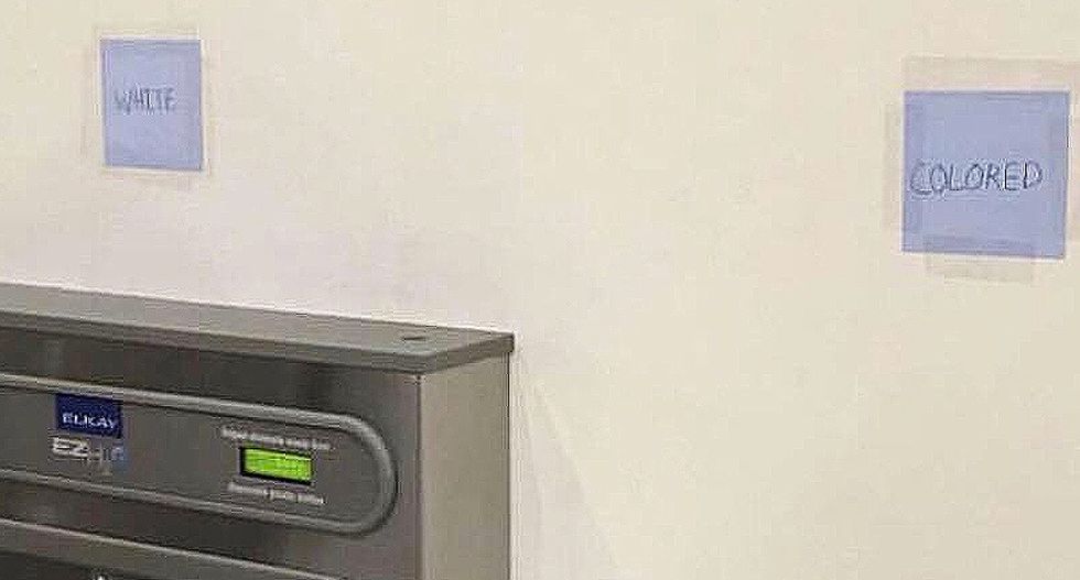 'White' and 'colored' water fountain signs inflame tensions at Wisconsin school plagued by racist incidents