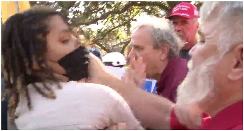 WATCH: Trump supporter rips mask off woman's face at 'Stop the Steal' rally in Florida