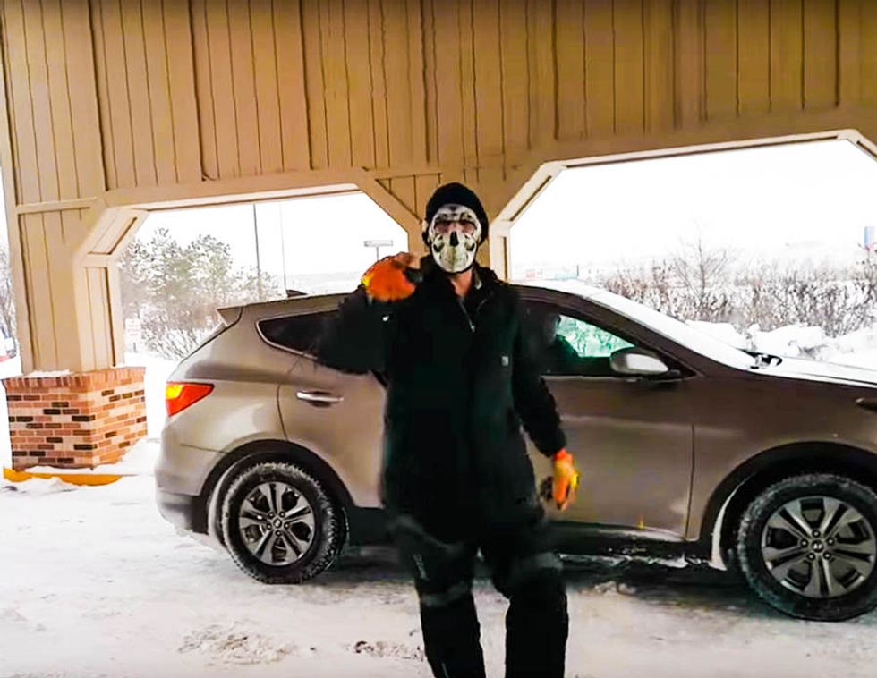 BUSTED: Cops arrest masked man who was caught on video threatening DAPL protesters