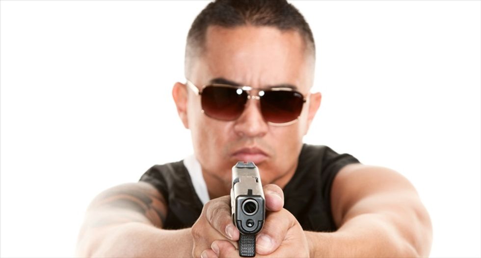Las Vegas 'sociopath' cop won't be fired for online posts about 'race war' and shooting Obama