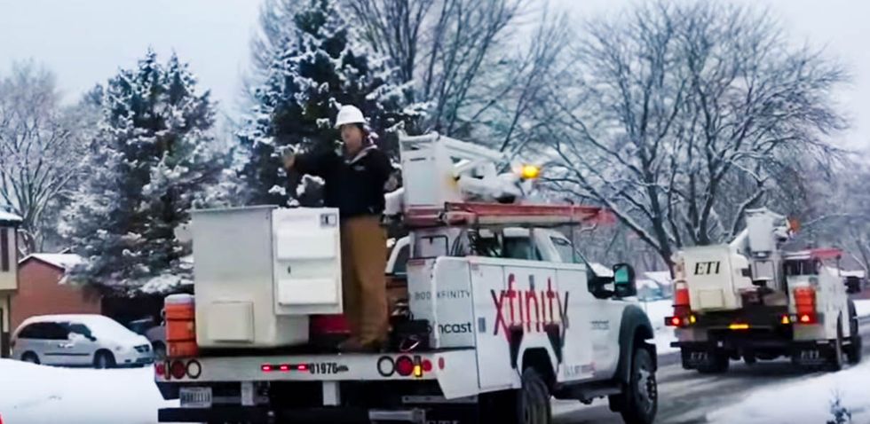 WATCH: Comcast driver refuses to move his road-clogging truck -- even as accidents pile up around him