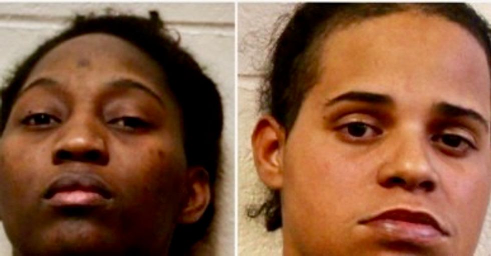 Two arrested after police discover house of horrors where children were beaten and locked away