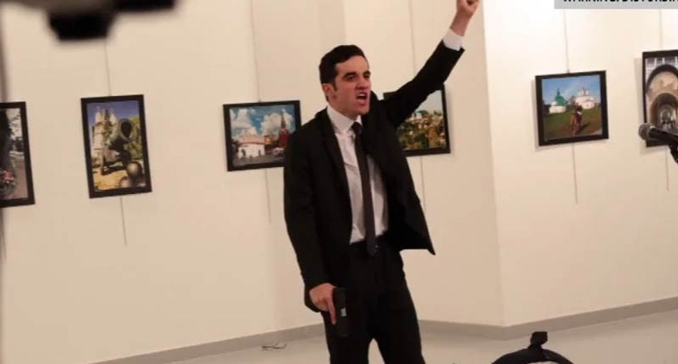 Russian ambassador Andrei Karlov assassinated in Ankara by Turkish policeman who yelled about Aleppo